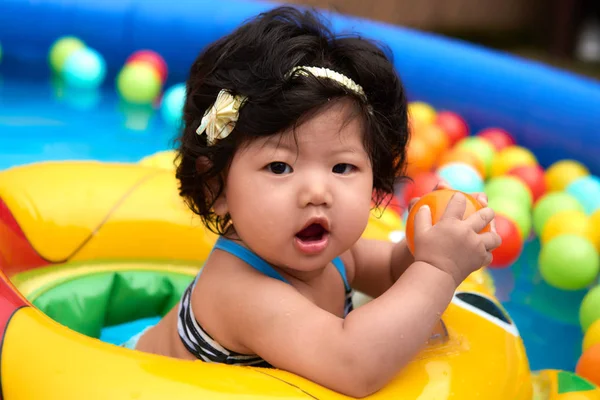 Swimming Baby Girl — Stock Photo, Image