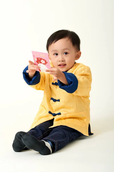 Chinese baby boy in traditional Chinese New Year outfit — Stock Photo, Image