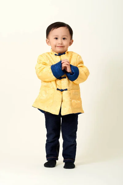 Chinese baby boy in traditional Chinese New Year outfit — Stock Photo, Image