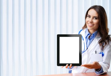 Doctor showing blank tablet pc for copyspace clipart