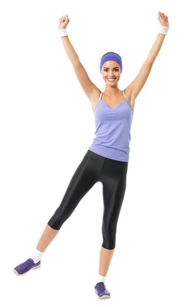 Glücklich lächelnde Frau springt oder macht Fitness-Aerobic-Übungen, — Stockfoto