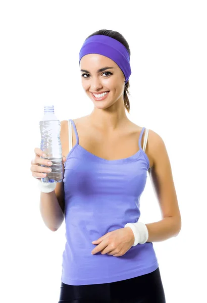Joven mujer en violeta ropa deportiva agua potable, aislado — Foto de Stock