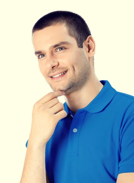 Porträt eines glücklich lächelnden jungen Mannes lizenzfreie Stockfotos