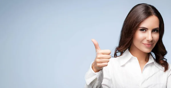 Businesswoman, showing thumb up hand sign gesture , over grey — Stock Photo, Image