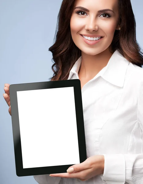 Businesswoman showing blank tablet pc, on grey — Stock Photo, Image