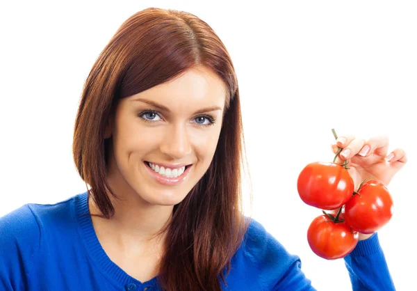 Giovane donna felice sorridente con pomodori — Foto Stock