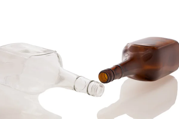 Dwie butelki leżące — Zdjęcie stockowe
