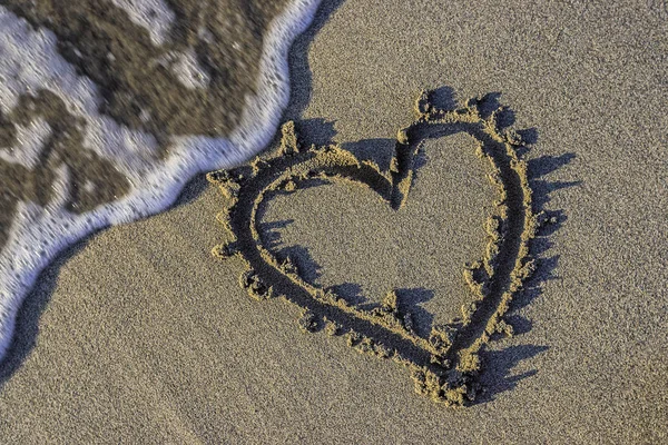 Hart in het zand — Stockfoto