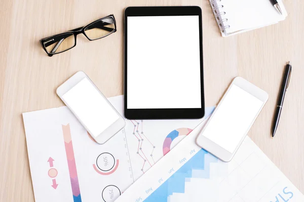 Tablet and two white smartphones — Stock Fotó