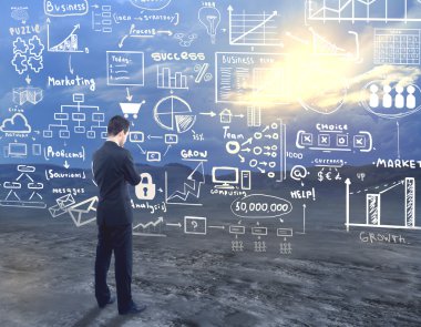 Düşünceli işadamı peyzaj arka plan üzerinde soyut iş kroki bakarak. Beyin fırtınası konsepti