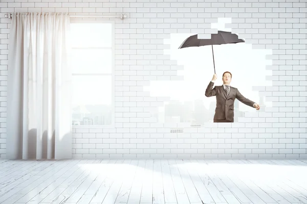 Mann fliegt mit Regenschirm — Stockfoto