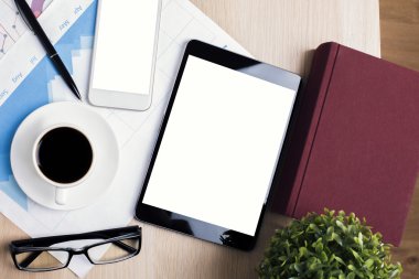 Workplace with tablet and cellphone