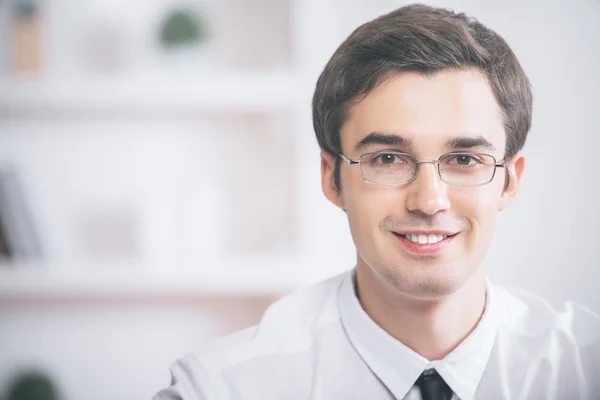 Portrait of young businessman in glasses — Stock Photo, Image