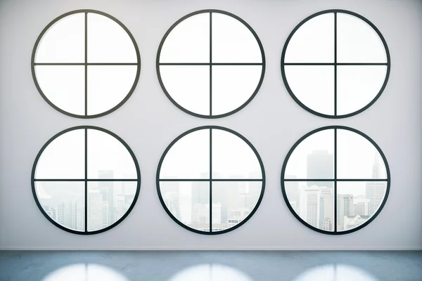 Konkreta interiör med runda fönster — Stockfoto
