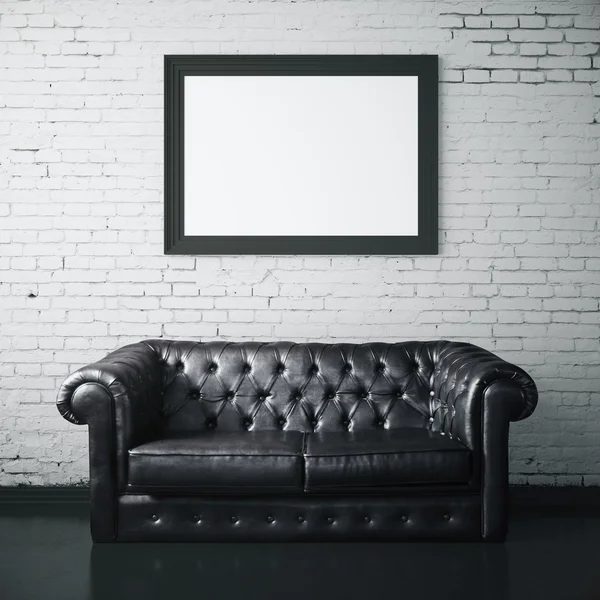 Leather couch and picture frame — Stock Photo, Image