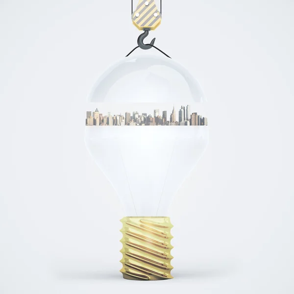 Ampoule abstraite avec ville suspendue sur crochet de grue. Fond clair. Concept d'idée. Rendu 3D — Photo