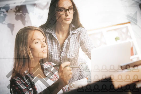 Girls using laptop with digital pattern — Stock Photo, Image