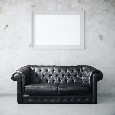 Deri kanepe ve fotoğraf çerçevesi