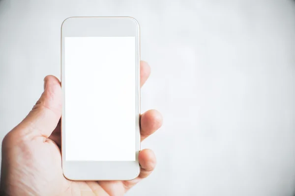 El holding beyaz smartphone — Stok fotoğraf