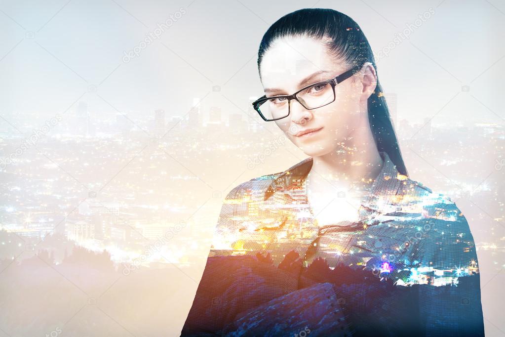 Businesswoman on abstract city background