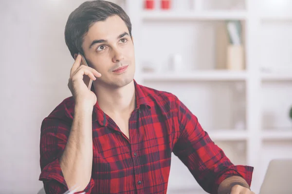 Guy talking on phone