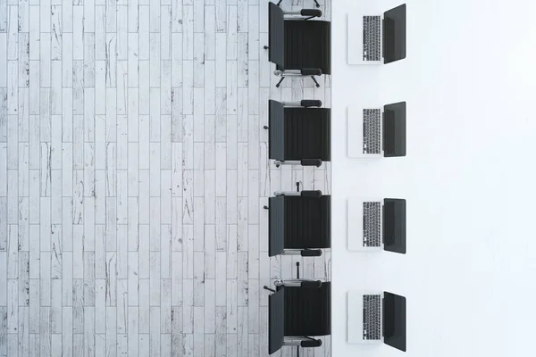 Table with laptops and chairs — Stock Photo, Image