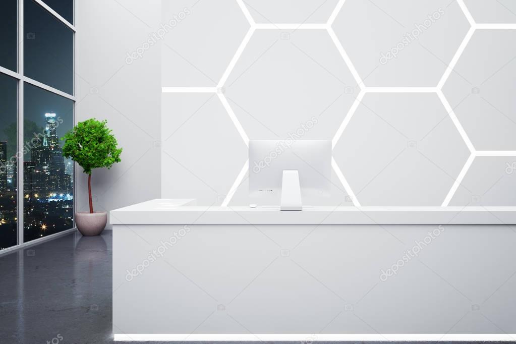 Modern reception desk with computer in interior with honeycomb pattern on wall, decorative plant and night city view. 3D Rendering