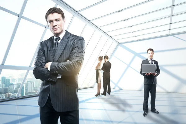 Businesspeople in modern interior — Stock Photo, Image
