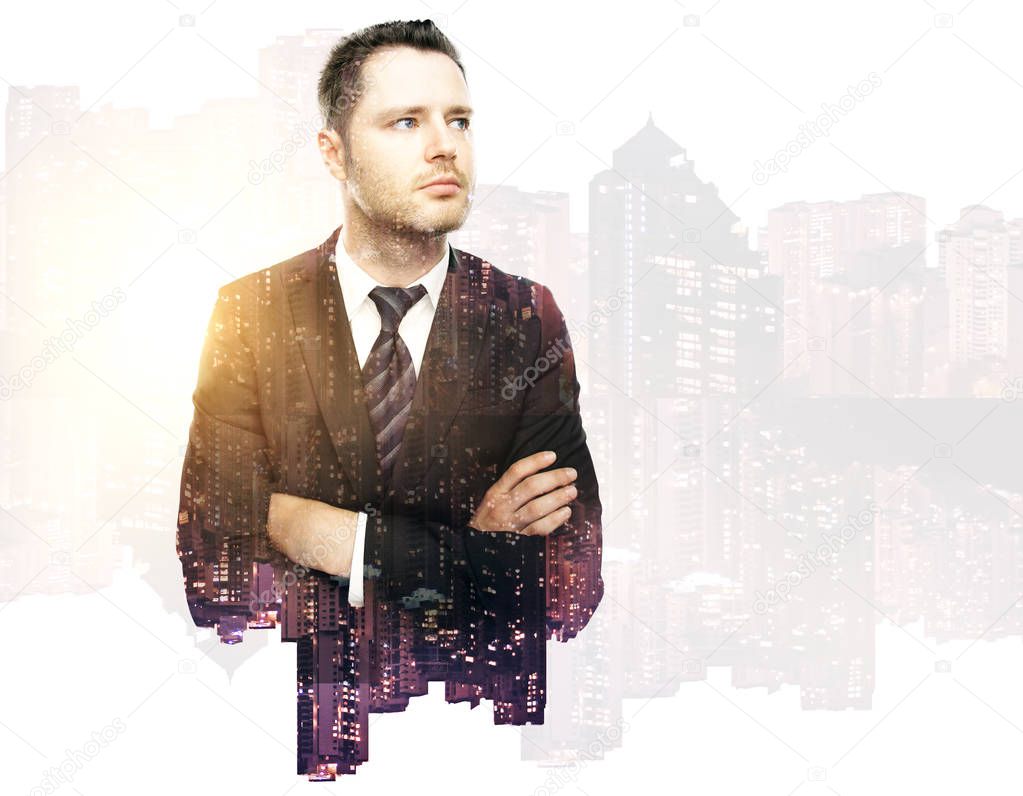 Thoughtful handsome business man on city background. Double exposure. Research concept