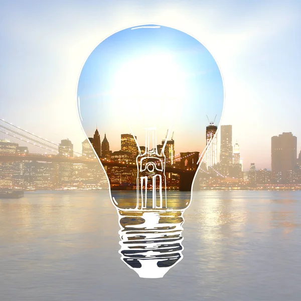 Creative light bulb sketch on bright city background. Idea concept. Double exposure