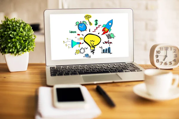 Närbild på arbetsplatsen med kreativt företag skiss på laptop skärm, kaffekopp, växt, smartphone och andra objekt. Framgångskoncept — Stockfoto