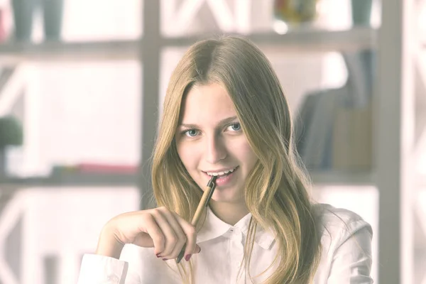 Woman with pen portrait — Stock Photo, Image