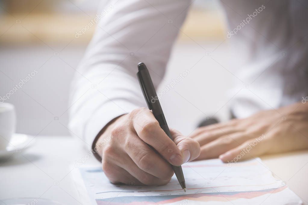 Man signing contract