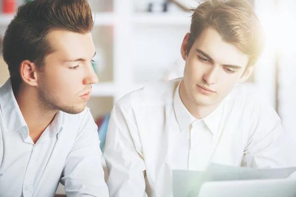 Handsome businessmen doing paperwork — Stock Photo, Image