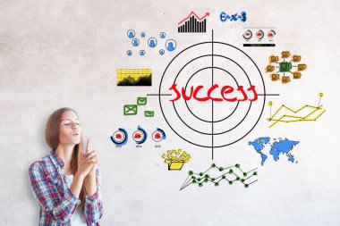 Mutlu genç kız, yaratıcı iş kroki beton zemin üzerine silah parmak üfleme. Kavram amaçlayan