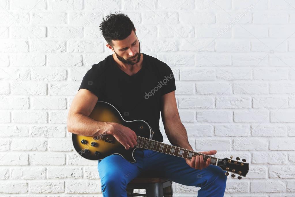 Man playing the guitar