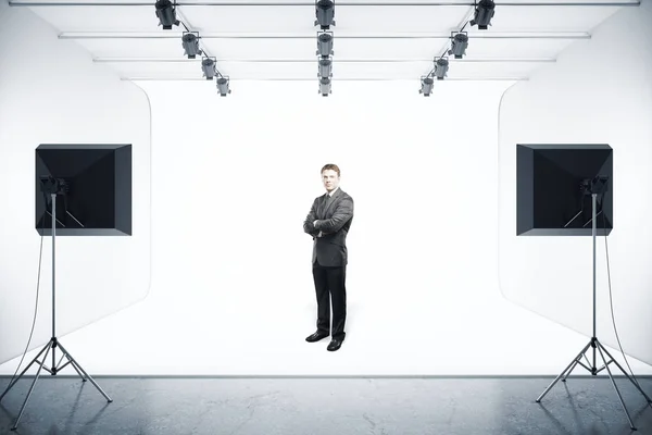 Businessman in photo studio — Stock Photo, Image
