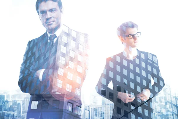 Two handsome businessmen on creative city background. Double exposure. Employment concept — Stock Photo, Image