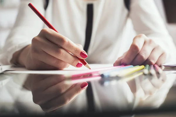 Female drawing with colorful pencils — Stock Photo, Image