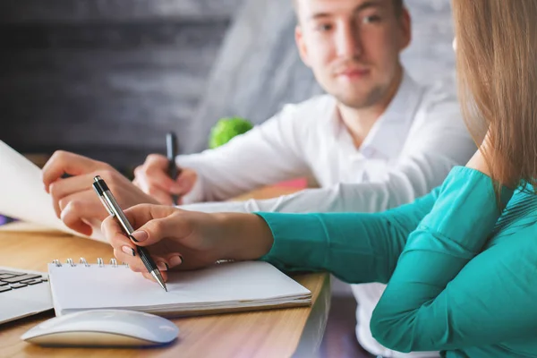 Man and lady's hands working on project — Stock Photo, Image