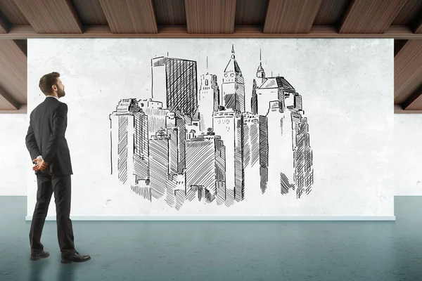Привлекательный молодой бизнесмен смотрит на белую доску с городским эскизом в новом интерьере. Промышленность. 3D рендеринг — стоковое фото
