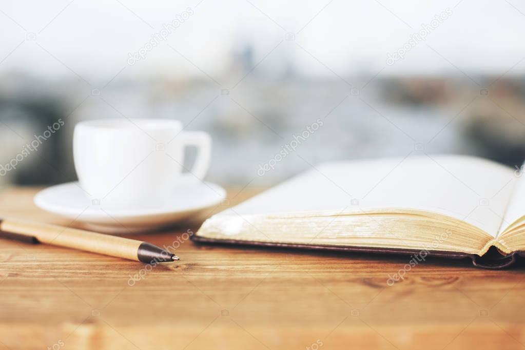 Wooden desktop with coffee 