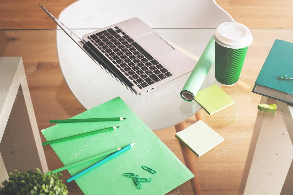 Glass office desk with coffee