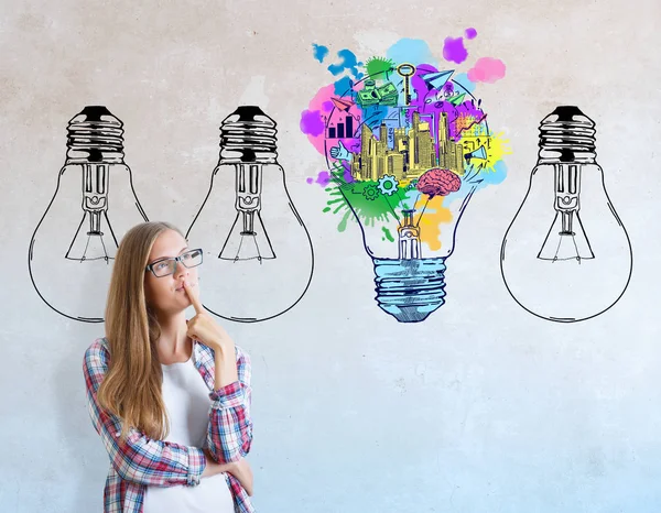 Portrait of young european woman on concrete background with business sketch and lamps. Idea concept — Stock Photo, Image