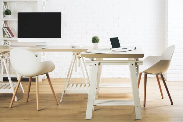 Clean office with empty pc and laptop — Stock Photo, Image