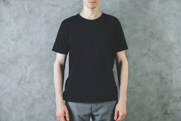 Guy in empty black shirt front — Stock Photo, Image