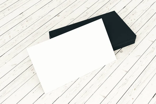 Light wood plank surface with empty black and white business cards. Information concept. — Stock Photo, Image