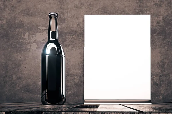 Empty beer bottle and poster