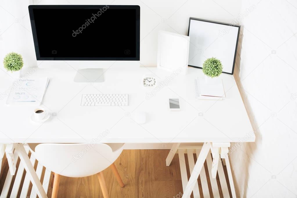 White workplace with empty pc 