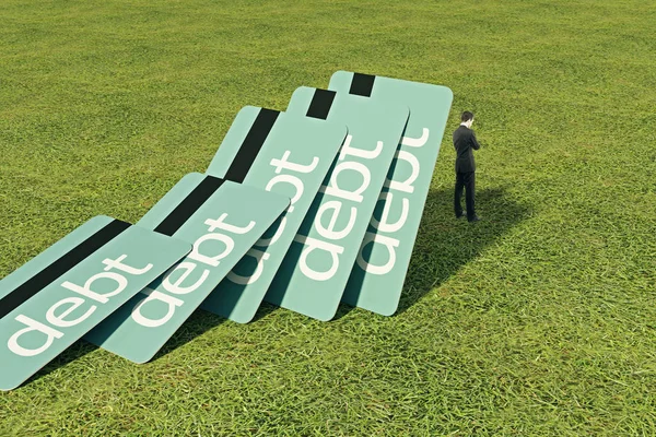 Tarjetas de deuda azul cayendo sobre pensativo hombre de negocios de pie en la hierba. Concepto desafío. Renderizado 3D — Foto de Stock